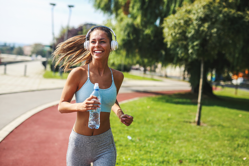 woman running with headphones