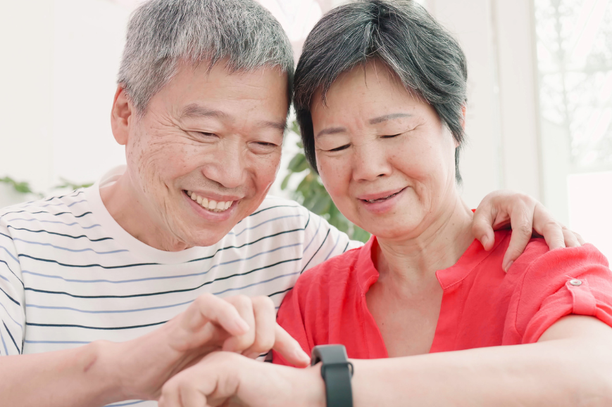 Grandparents using their smart watch