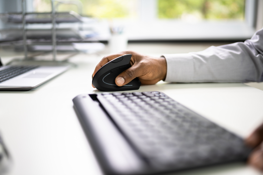 Man using vertical ergonomic mouse