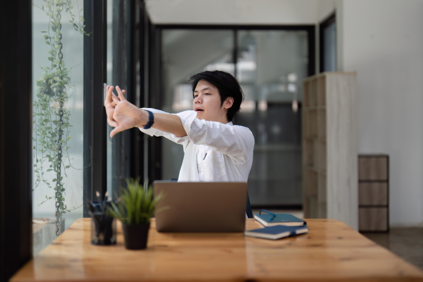 Man doing Wrist Flexor Stretch