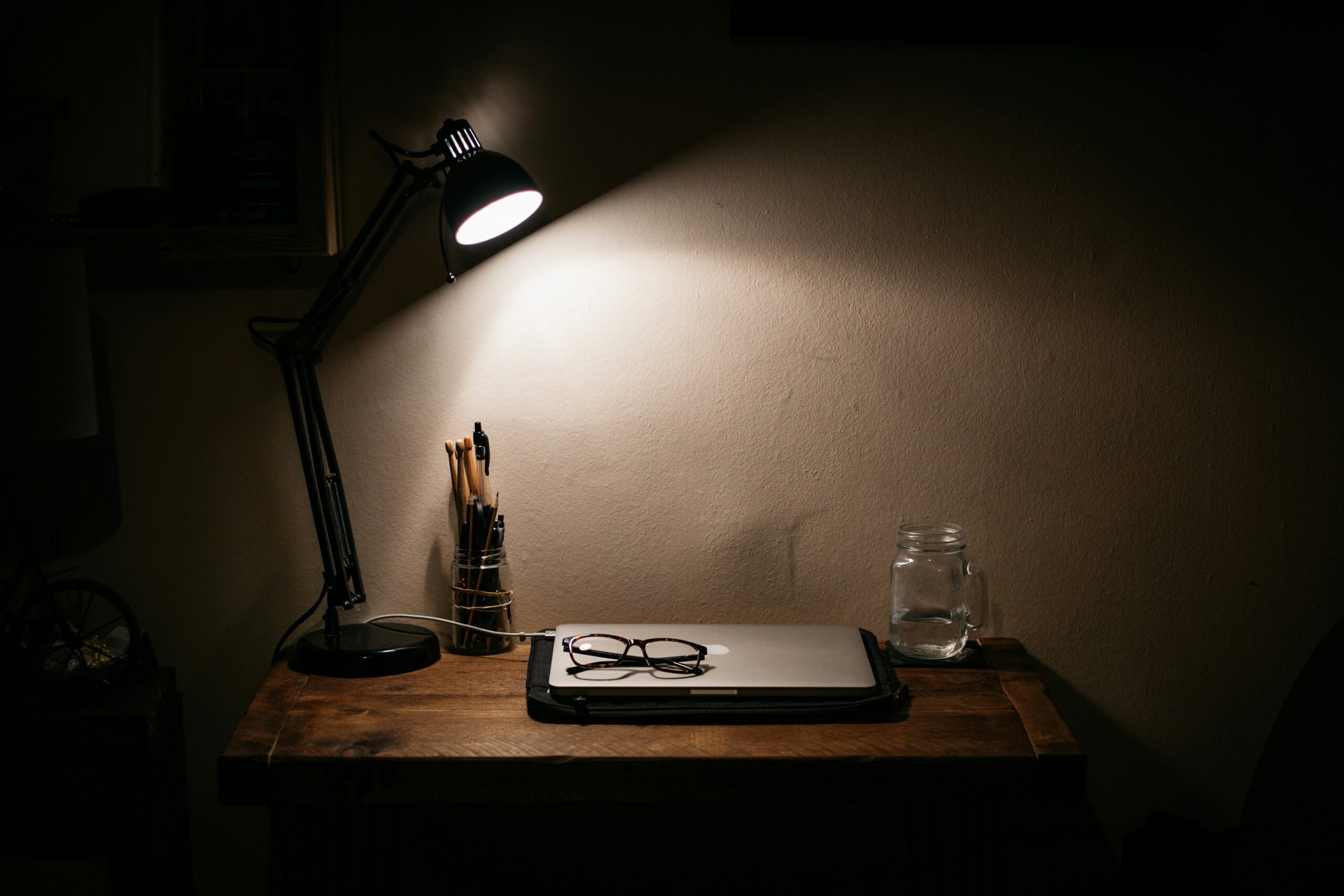 Workspace with desk lamp for lighting
