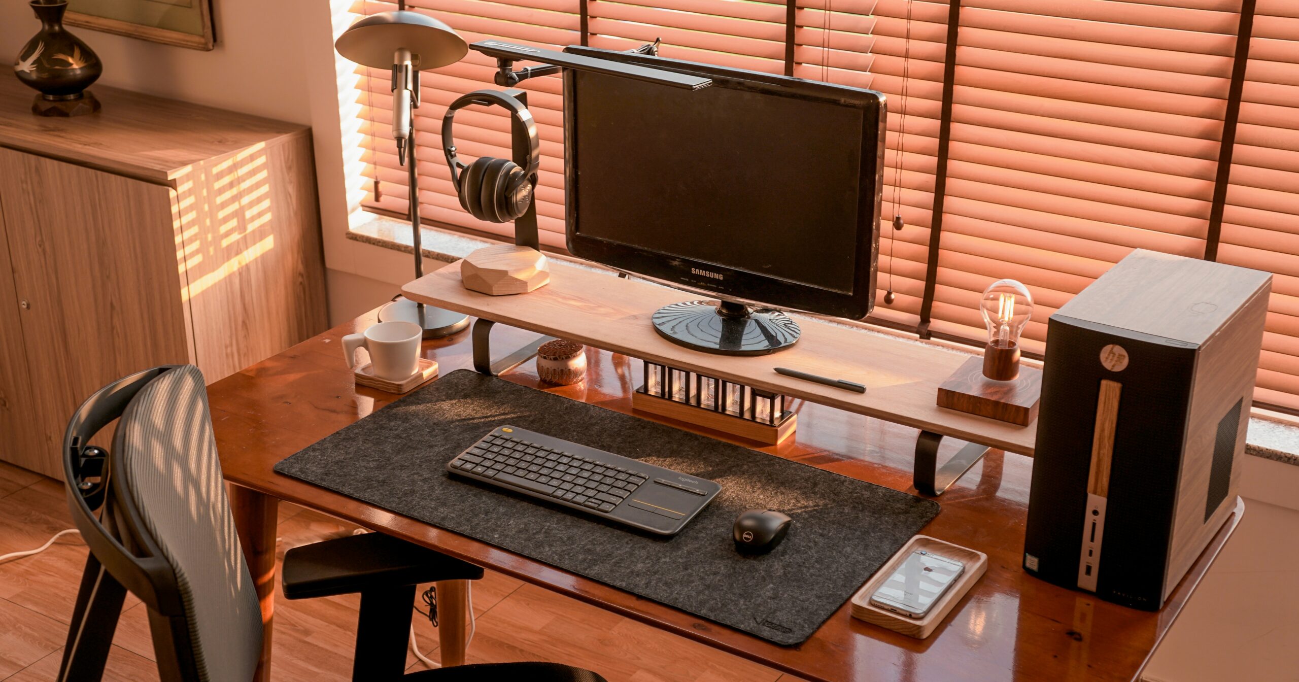 Desktop computer setup designed for comfort with footrest and straight-back seating