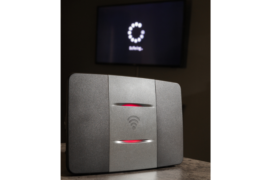 A smart device with loading connected TV image at the back