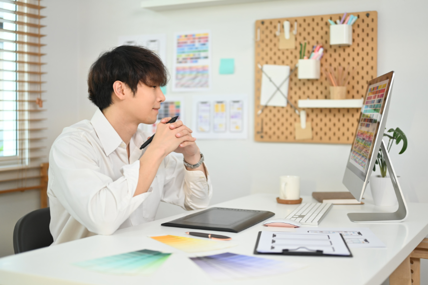 Man in front of his computer