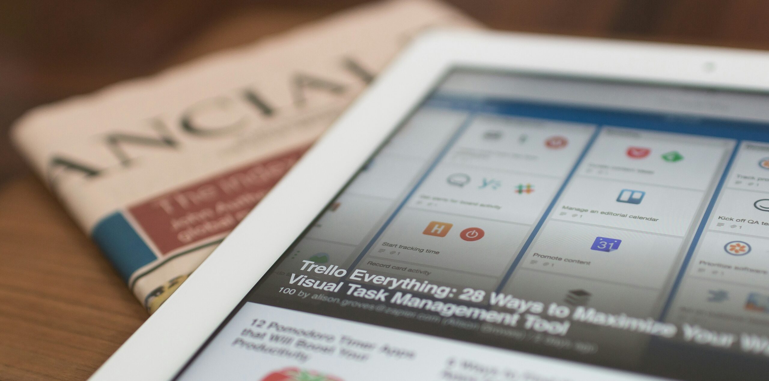 Tablet screen an article about Trello