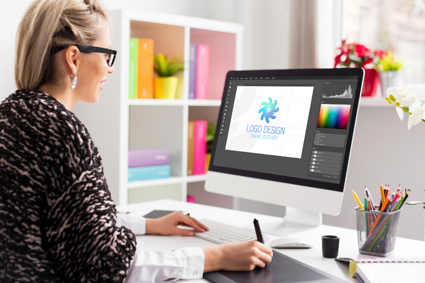 Woman doing a logo design on her computer