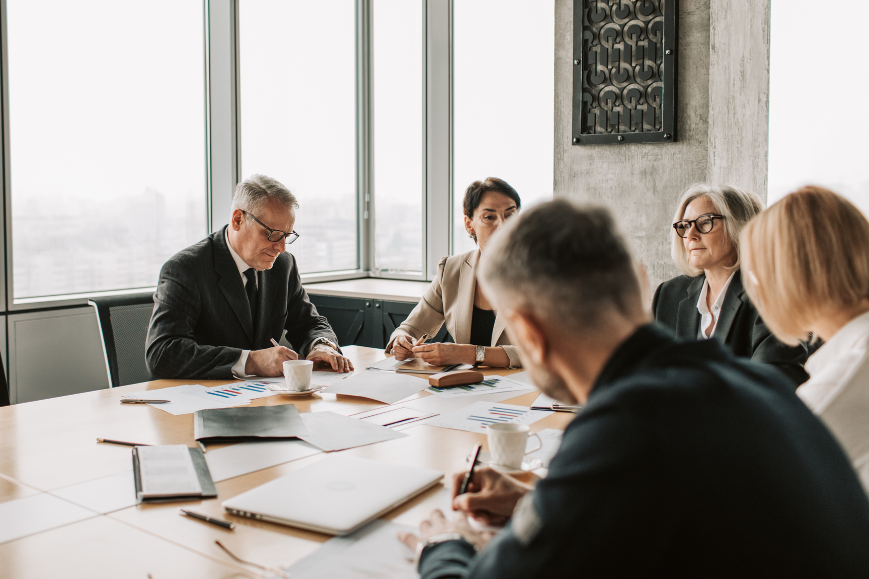 Modern office with professionals who have different hairstyle preferences.