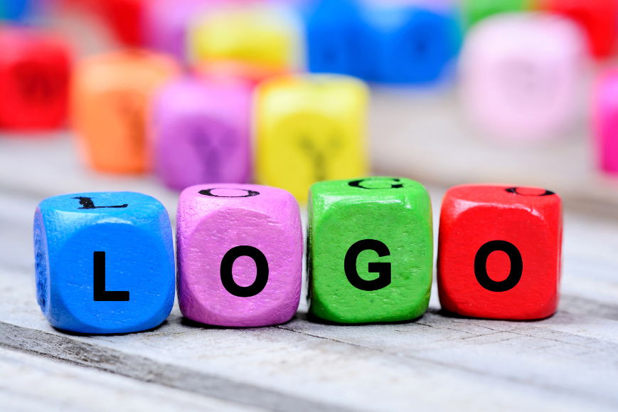 Cubes with L, O, G, O letters on it