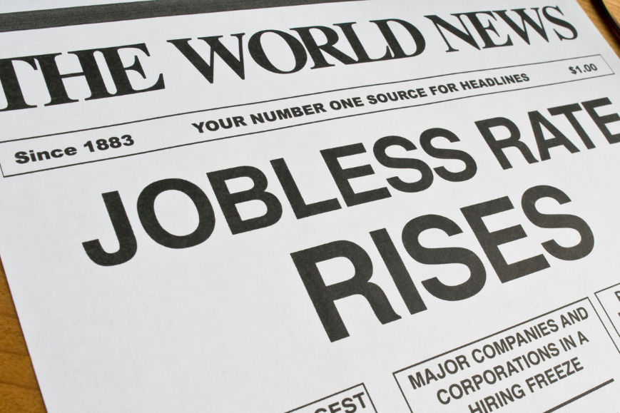 Image of a paper highlighting "Jobless Rate Rise" and "Hiring Freeze" terms